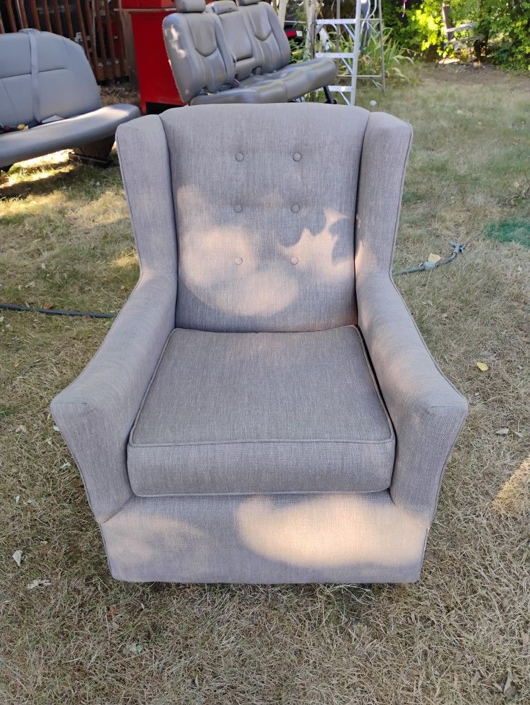 Tuft Wingback Swivel and Gliding Chair $100