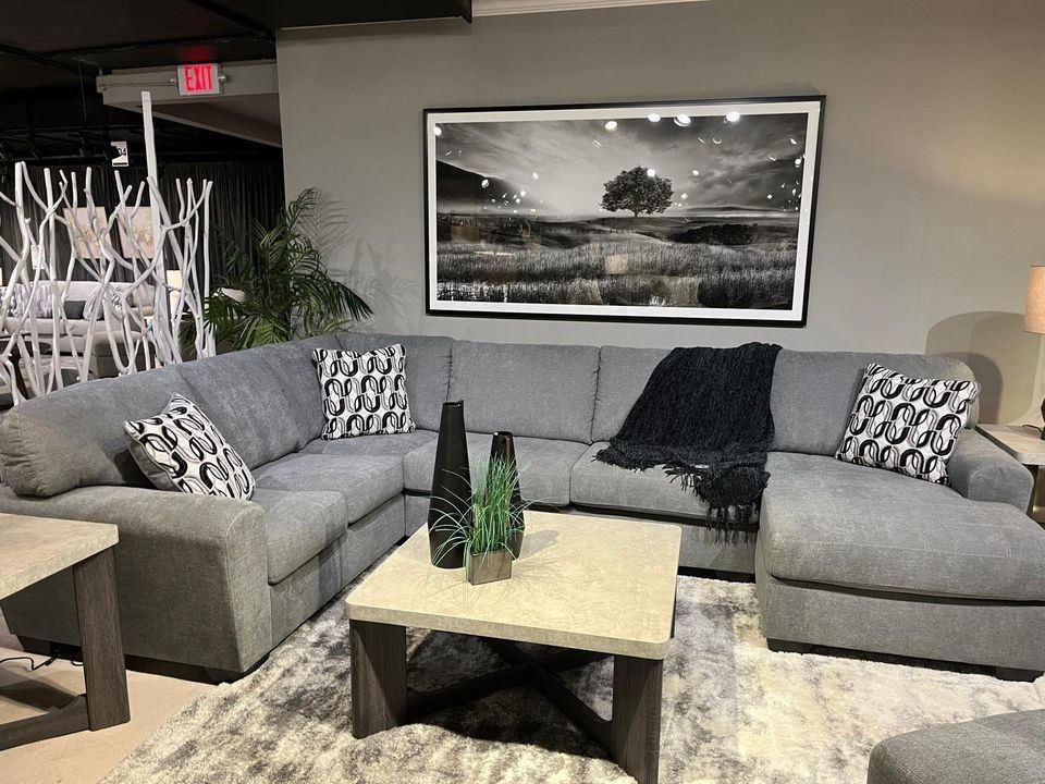 Brand New 3 Pc Grey Sectional features jumbo stitching w/cozy appeal