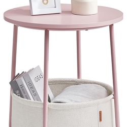 Pink nightstand with woven basket