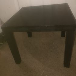 1 Black Leather Chair And 1 Black Patio Table 