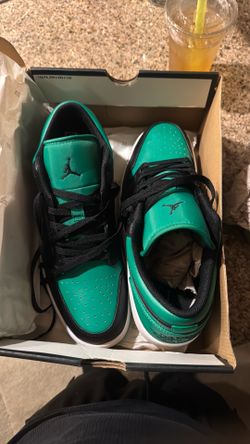 Black/Green/White Air Jordan 1s Low top.