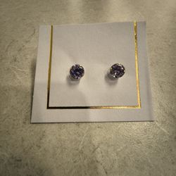 10k gold, simulated purple diamond earrings.