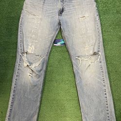 Levi 559 light wash distressed denim jeans