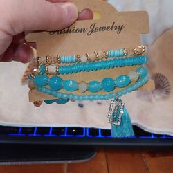 Turquoise Beading Stretch Bracelet  With Charm And Tassle