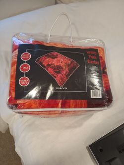 Embossed soft warm blanket