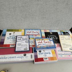 A Lot Of Scrapbooking Paper Mat Stacks