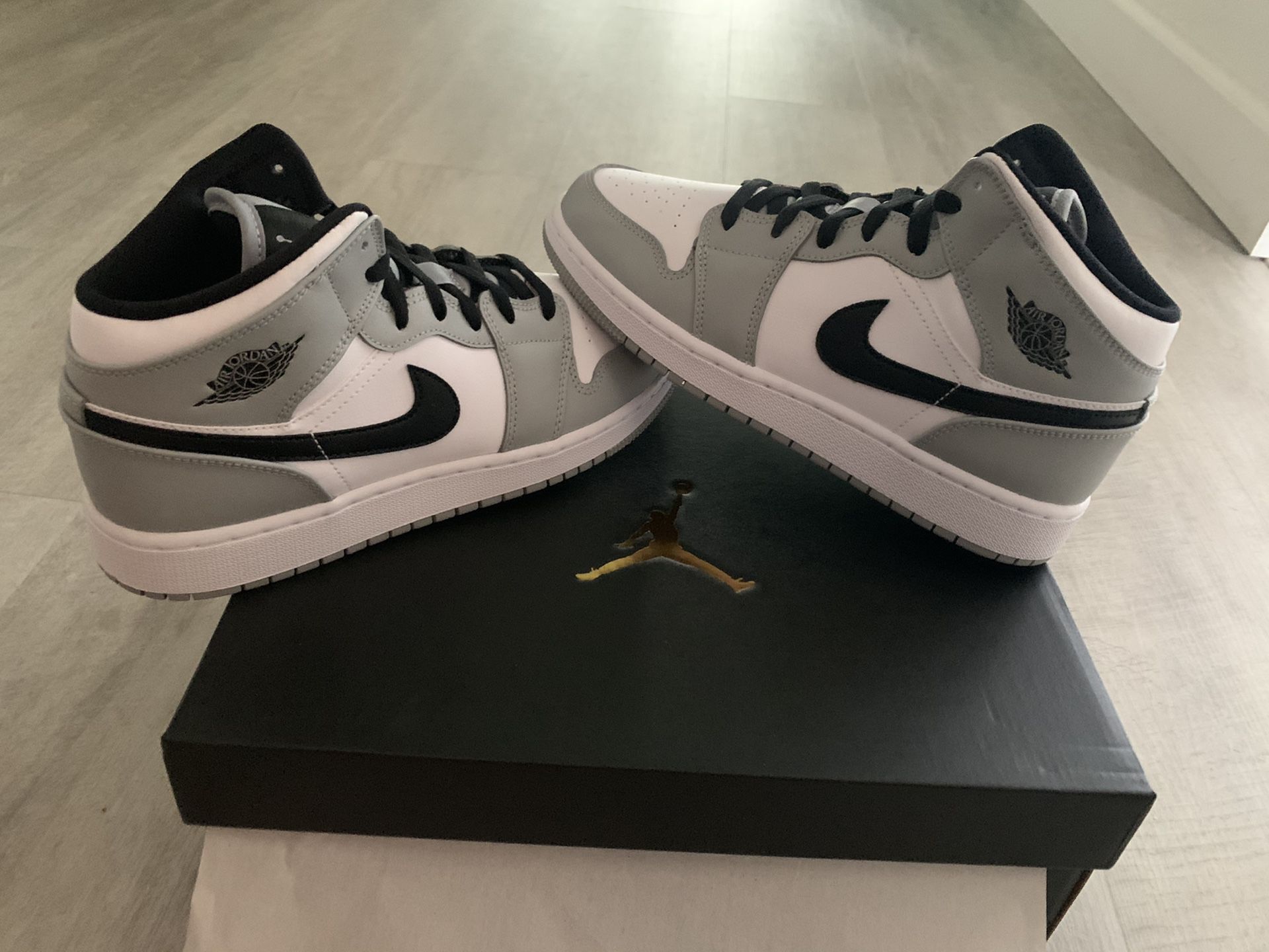 Nike Air Jordan 1 Mid Grey Size 8 (women), 6.5(kids), 6.5 (men)