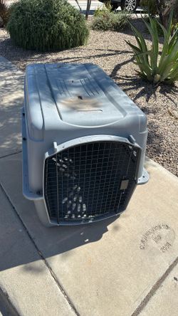 Extra large dog crate 40 inches long by 30 inches high and 27 inches wide