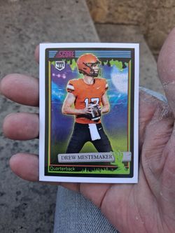 2026 Panini Score-A-Treat (NIL) Drew Mestemaker #135 (Pre Rookie) Quarterback Oklahoma State Cowboys College - Green Slime. Near Mint/Mint Condition.