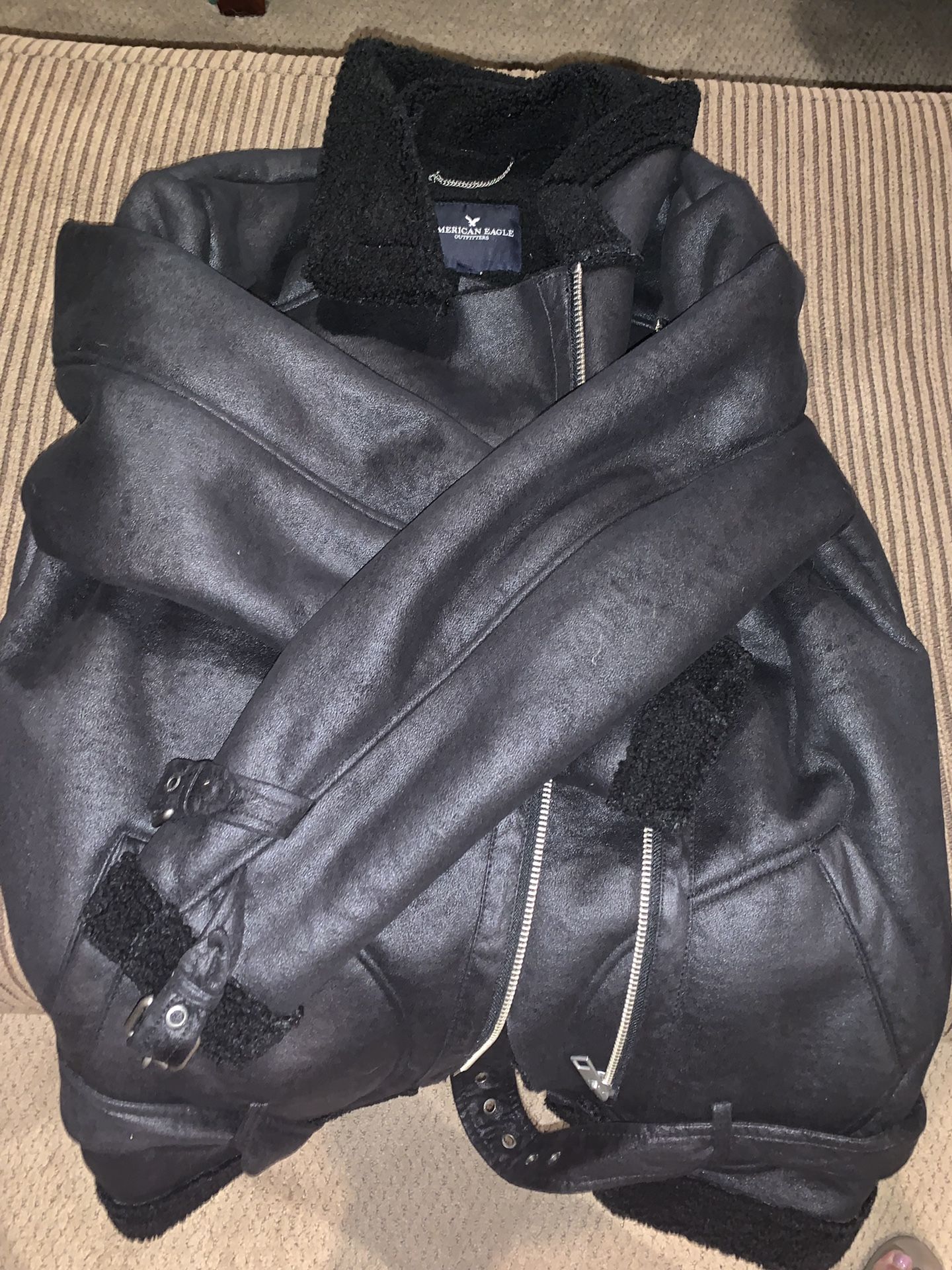 Black bomber jacket.