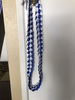 White and dodger blue graduation ribbon lei