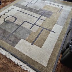 8 x 10 Hand Knotted Tibetan Wool Area Rug. Endless Knots brand. Very thick