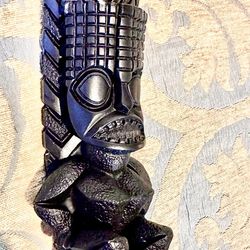 Hawaiian Lava Wood Sculptures Kanaloa Tiki God of Eternal Hope with dimensions H8xL2xD2.5 inch Lbs 0.5. This is an original Hawaii art item carved in 