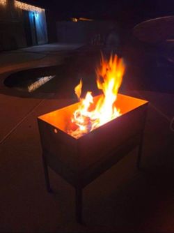 Custom fire pit  ( steel) VERY HEAVY plus wood
