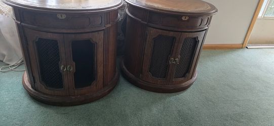 Two round end tables with very big storage underneath
