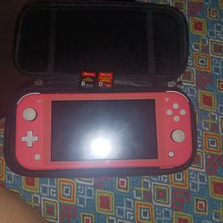 Nintendo Switch Lite (Salmon Color) With Games