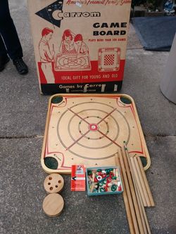 Likr new 1970's Carrom game board. Play over 100 games. All orignal piece included, Box, and player manual. Well taken care of, well stored. 150$
