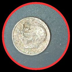 Error Dime . Clad Error An X On His Mouth A One Of A kind It Is Like Crinkle under The Clad Layer Makeing A Protuding X On The Coin