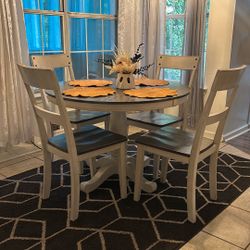 Table On Four Chairs 