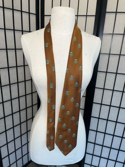 Resisto Tie brown w/turquoise crest