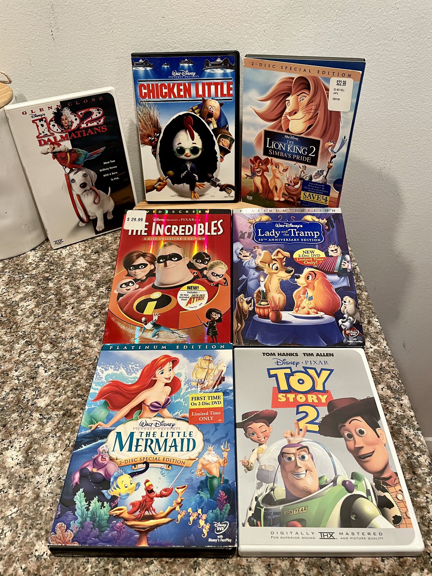 Disney Animated Movies Lot - 7 Classics: Toy Story 2, The Little Mermaid, The Incredibles, 102 Dalmatians, Chicken Little, Lion King 2, Lady and the T