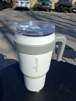 The cup is new, but has a defect on the lid.