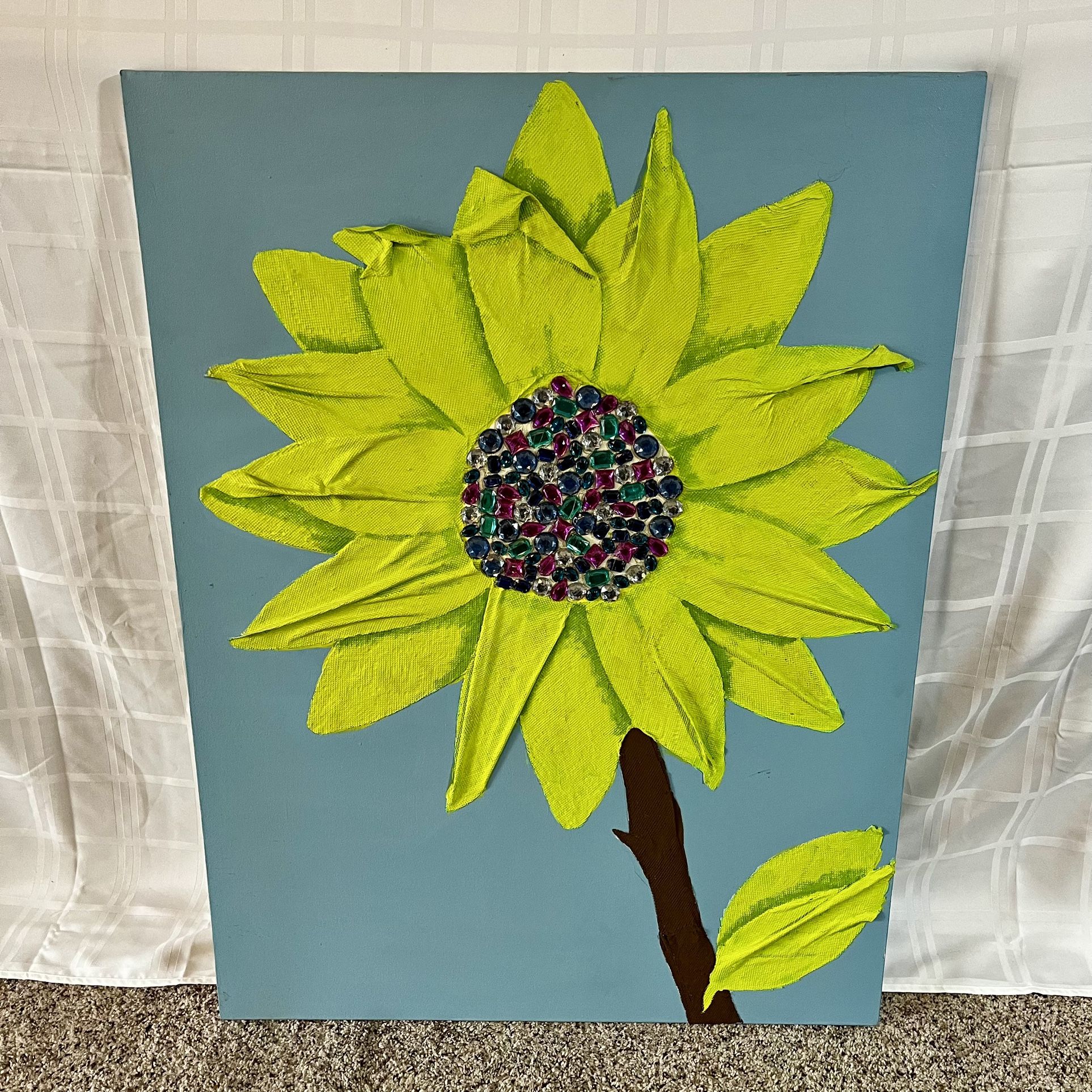 mixed media 3D artwork of a flower with colorful gems in center, 40” tall x 30” wide