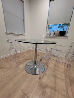 Glass table with chairs