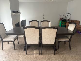Chocolate table with 6 chairs