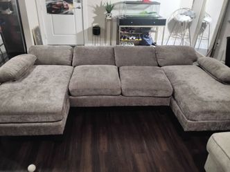 Dark gray u shaped sofa