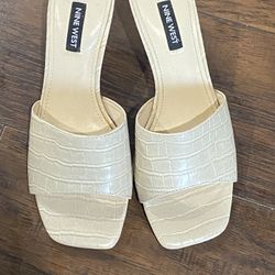  West Marina slide sandal in ivory croc embossed leather.  