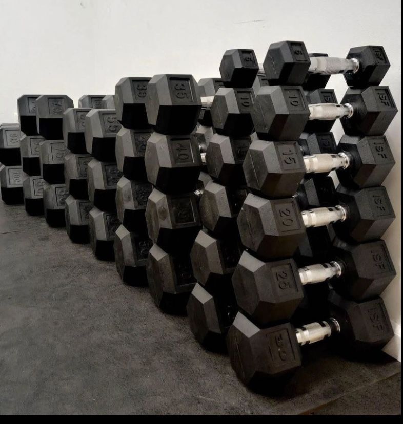 All brand new rubber hex dumbbells 5 pound through 100 pound