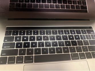 2016 MacBook Pro 16in retina screen touchbard