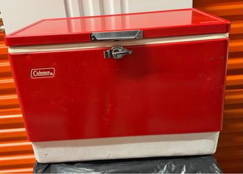 Vintage red metal Coleman ice chest