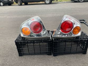 Nissan Maxima Head Lights ( used )