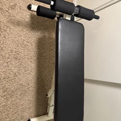 Bench press with two 35 lb dumbbells.