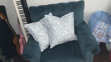 Blue cloth chair from Raymour and Flanagan in good state not used. Need to get rid of it soon. pillows included.