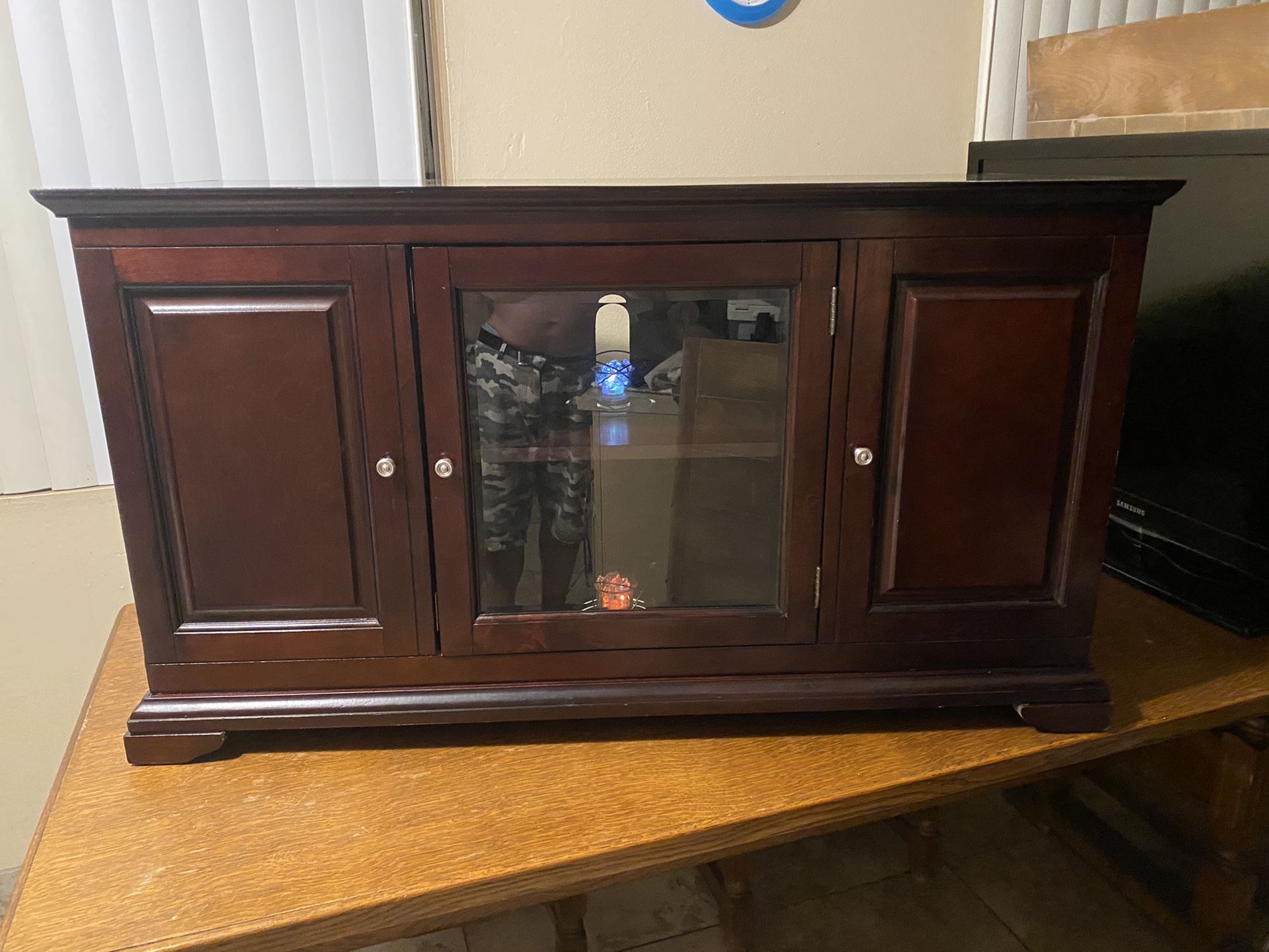 Cherrywood cabinet (real Wood) And with shelves on each end and middle. Check out my other items on my profile page