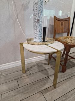 Marble side table with golden legs