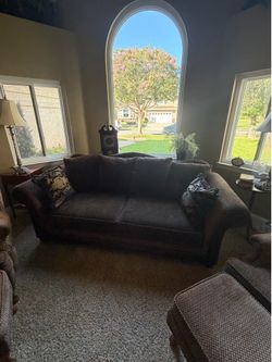 Couch with chairs and leg rests