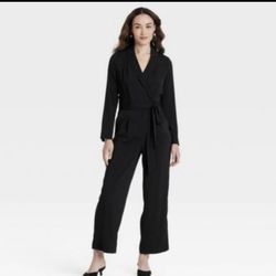 New with tags- women’s black long sleeve jumpsuit/romper