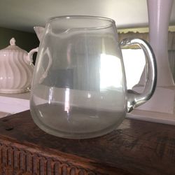 Glass and porcelain pitchers