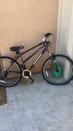 Nishiki purple adult bike