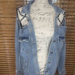 Custom made denim jacket with chain cage shoulders d Back  detail.