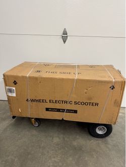 Flynama Four Wheels Compact Travel Mobility Scooter with 300w Motor- Chrome Model #L-P198329  $1655 plus tax at Lowe's website new still in the box