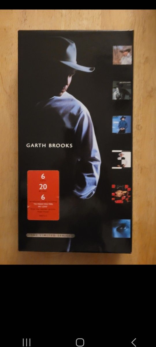 Garth Brooks  cd box sets (6) and vol 1-3 Anthology Books...see photos