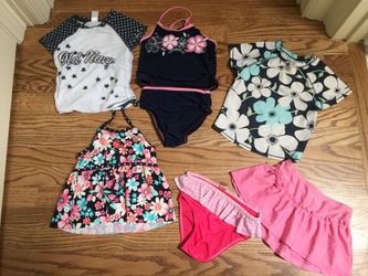 Little Girl swimming wear. Swim suits.