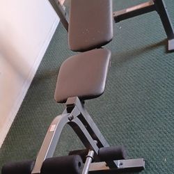 Weight Lifting Bench Press With Leg Extension