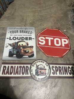 Tow Mater signs