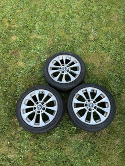 3 BMW Rims Plus 1 Black Rim